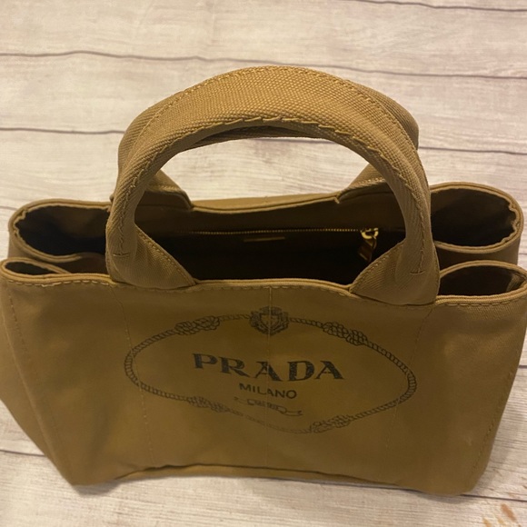 Prada linen shopping bag 13X8x. Good condition. Very clean Tan. Side pockets - Picture 10 of 16